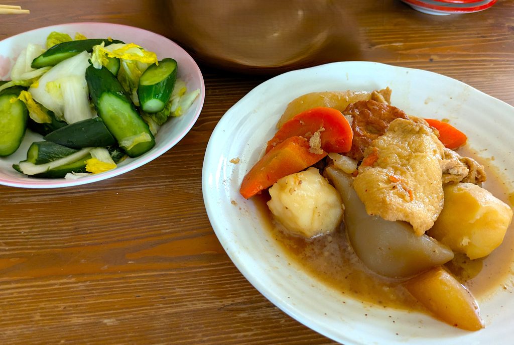 Japanese simmered dish nimono served in a home setting, traditional homemade cooking